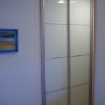 Armario corredero lacado blanco perfil inox