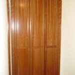 Frente de armario plegable en cerezo teñido