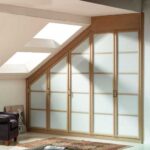 Armario de puertas abatibles para buhardilla