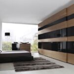 Armario corredero combinando cerezo y cristal dacobel negro sin listeles