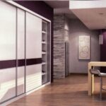 Frente de armario corredera con perfiles y listeles en inox