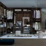 Vestidor en melamina de nogal con cajoneras, ropa corta y ropa larga