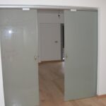 Puerta de cristal corredera doble satenlux