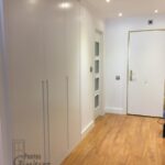 Frente de armario liso lacado blanco tirador fresado