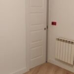 Puerta corredera Lisa 4 cuadros lacada en blanco